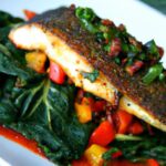 Fiery Blackened Tilapia Meets Tender Sautéed Spinach Delight