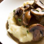 Creamy Mashed Potatoes with Savory Mushroom Gravy Delight