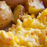 Golden Morning Delight: Cheesy Potato Egg Scramble Recipe