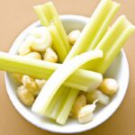 Crunchy Harmony: Celery Sticks Paired with Almond Butter