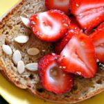 Wholesome Delight: Whole Wheat Toast with Almond Butter & Strawberries